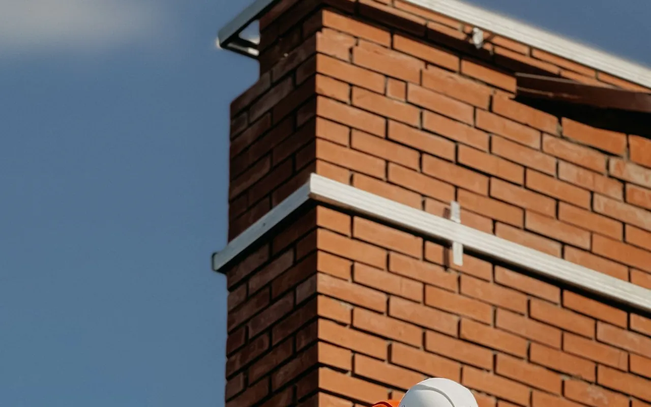 Contractor installing chimney at a home in the United States