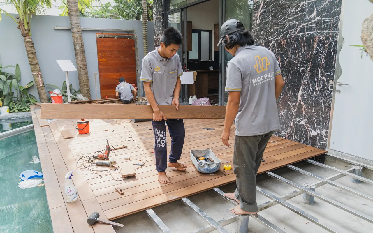 Contractor installing decks at a home in the United States