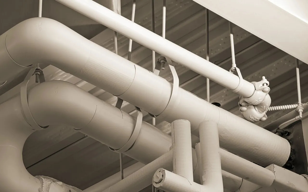 Contractor installing duct services at a home in the United States