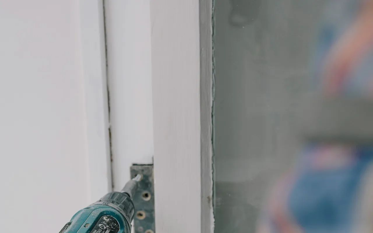 Contractor installing garage door installation at a home in the United States