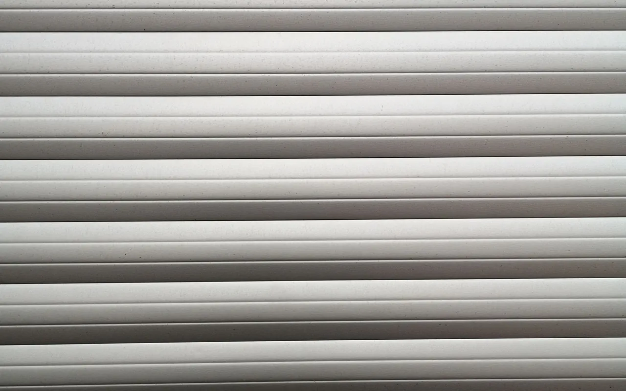 Close up of garage door installation materials on a residential job site