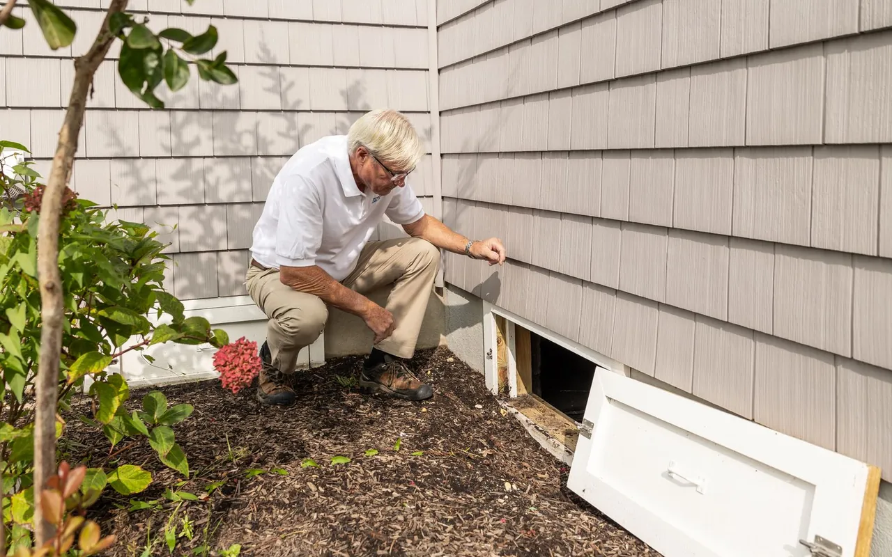 Contractor installing home security at a home in the United States