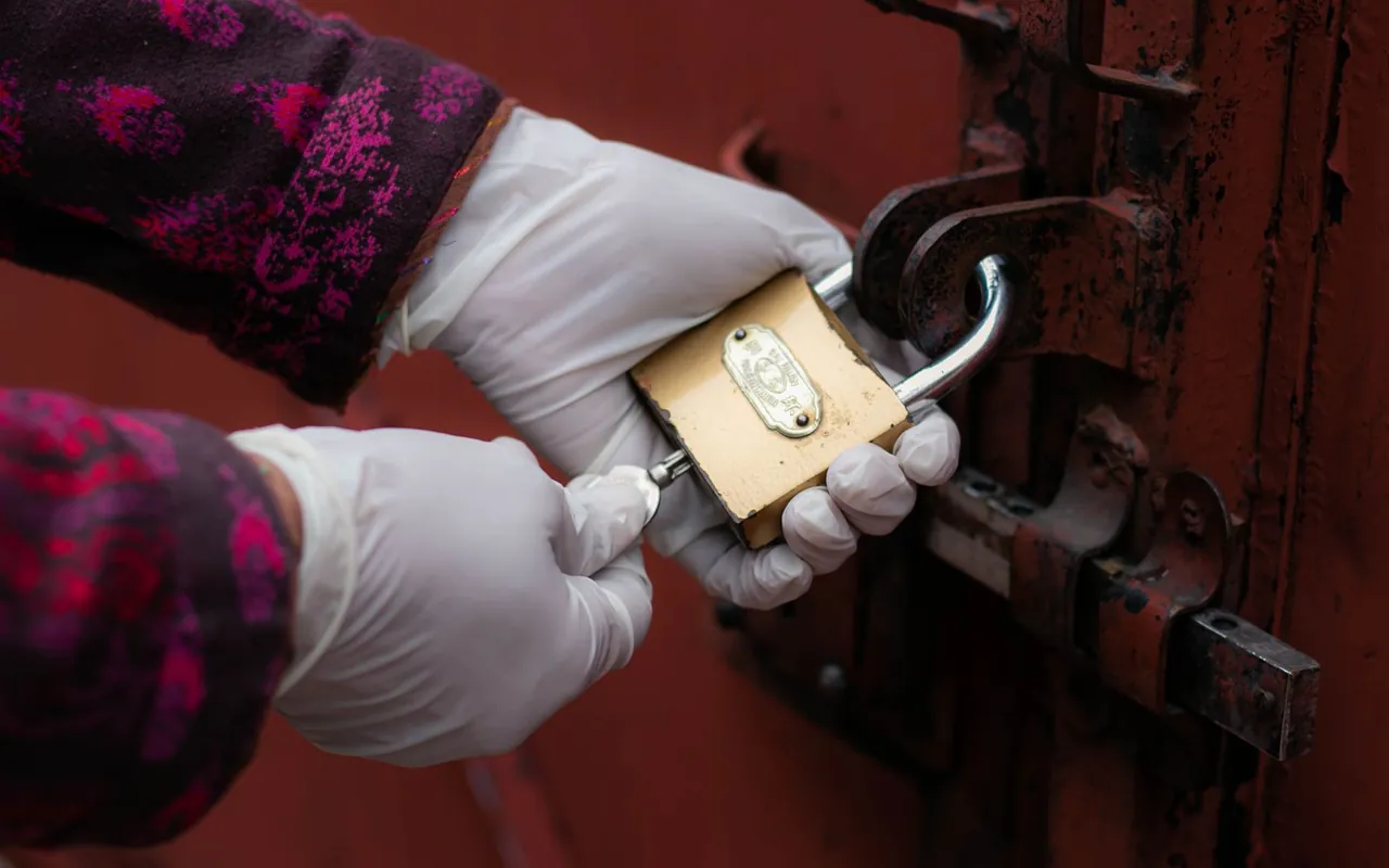 Contractor installing locksmith at a home in the United States