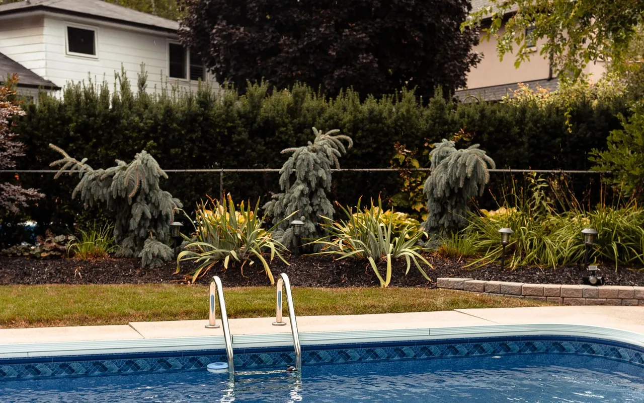 Completed inground pools project at a suburban home in the United States