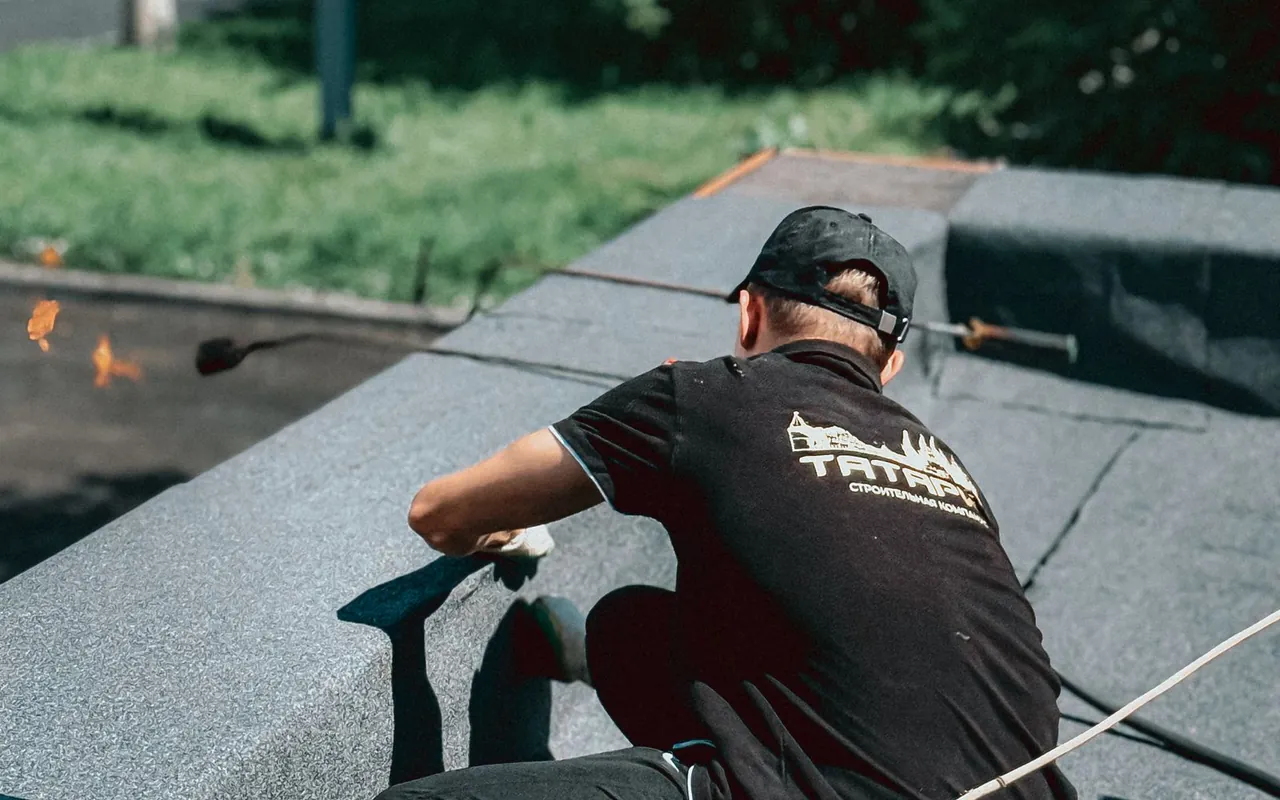 Contractor installing roof replacement at a home in the United States